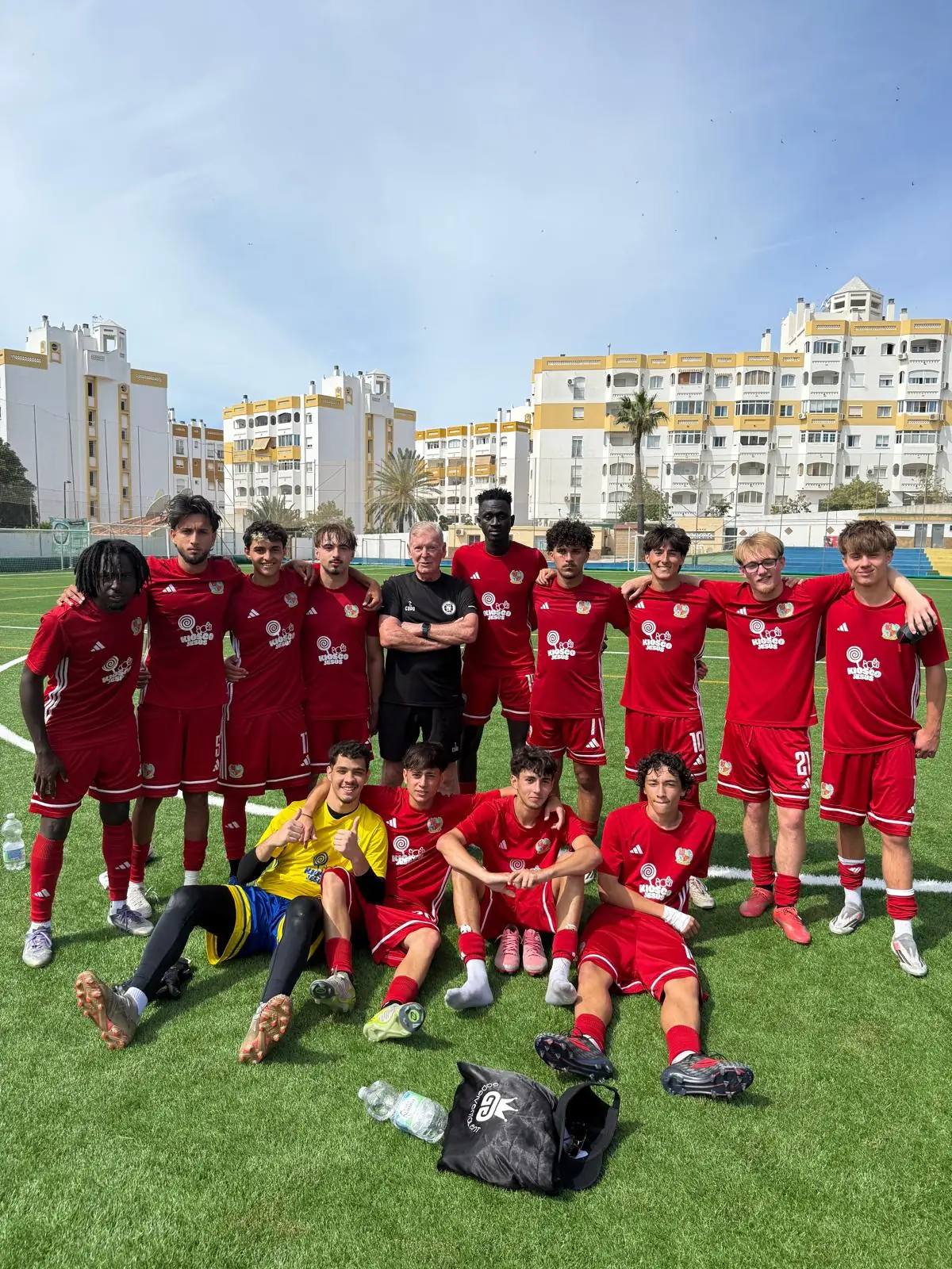 Don alongside the Real Internacional Football Academy team in Malaga
